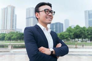 Photo of Asian businessman outdoors