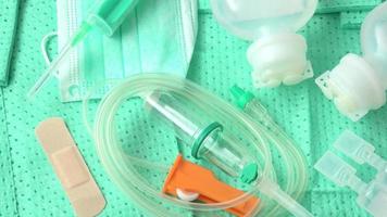 Disposable infusion set on green background