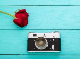 retro camera and roses - vedding love story concept copy space photo