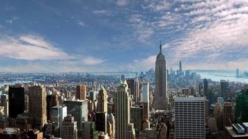 New York city skyline time lapse video from roof top with urban skyscrapers, New York, USA.