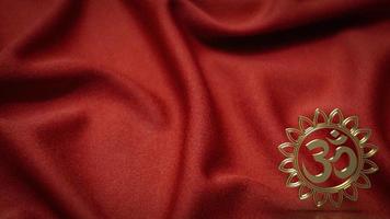 el símbolo hindú de ohmios de oro en seda roja para el concepto de fondo de representación 3d foto