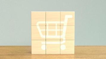 The shopping cart icon  on wood cube for business concept 3d rendering photo