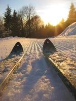 newly milled ski slope with skis photo