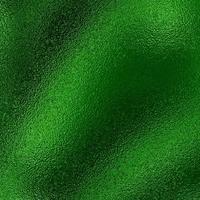 Green metallic foil background texture photo