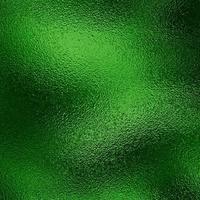 Green metallic foil background texture photo