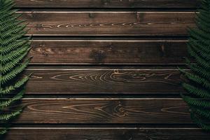 fern leaves on the background of old wooden photo