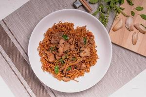 Spicy Stir Fried Instant Noodle with Pork and basil Pad Kee Mao photo