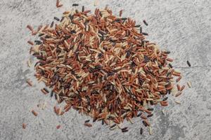 Raw three color jasmine rice.Thai rice grains photo