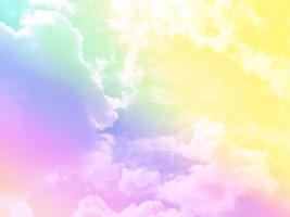 beauty sweet pastel pink yellow colorful with fluffy clouds on sky. multi color rainbow image. abstract fantasy growing light photo