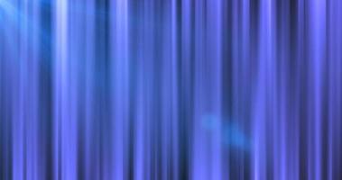 Abstract background, fabric curtain in the theater from vertical blue iridescent sticks of lines of stripes of bright shiny luminous beautiful photo