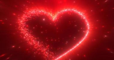 Glowing red love heart made of particles on a red festive background for Valentine's Day photo