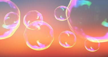 burbujas de jabón transparentes abstractas que vuelan hacia arriba, iridiscentes y brillantes, hermosas festivas contra el telón de fondo de la puesta de sol. fondo abstracto foto