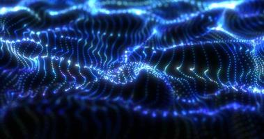 Abstract blue futuristic waves from a grid of particles lines glowing bright shiny neon digital magical energy on a dark background. Abstract background photo
