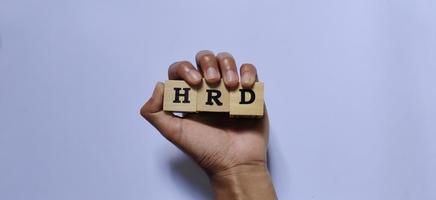 HRD Human Resource Development on wooden cubes photo