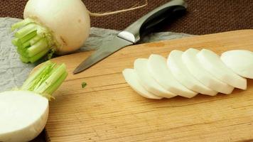 Japanese white fresh vegetable turnip root. Sliced daikon radish video