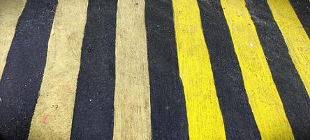 Abstract background of two different colored lines, common in city streets photo