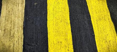 Abstract background of two different colored lines, common in city streets photo