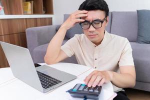 Young Asian man at home photo