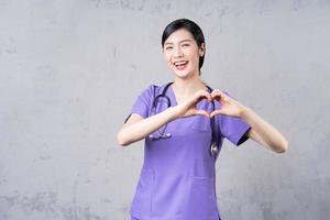 Portrait of young Asian female doctor photo