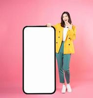 Image of young Asian businesswoman with smartphone mock up photo