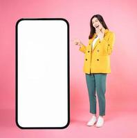 Image of young Asian businesswoman with smartphone mock up photo