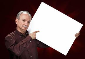 man holding billboard photo