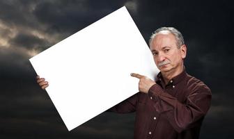 man holding billboard photo