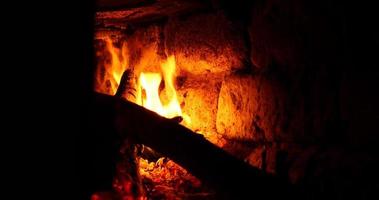 burning wood in a stone oven in the house, winter home heating. High quality 4k footage video