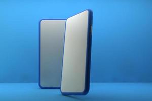 Smartphone with blank screen on blue background. 3D rendering. photo