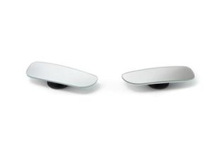 Car Blind Spot Mirror is an additional glass that is attached to the near side of the car's rearview mirror and can reach a wider view isolated on a white background. photo