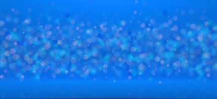 Defocused particles floating on a lined surface against a blue background photo