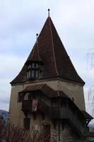 The tower of the cobblers in Sighisoara in different angles photo