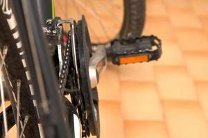 Rear wheel and chain of bicycle photo