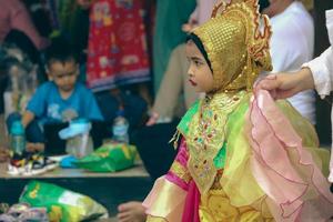 Jakarta, Indonesia in November 2022. Young children ranging from kindergarten to elementary school are taking part in the National Archipelago dance competition. photo