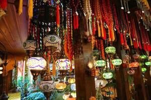 A bunch of traditional vintage turkish lamps in the gift shop at Turkey. photo