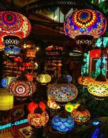 A bunch of traditional vintage turkish lamps in the gift shop at Turkey. photo