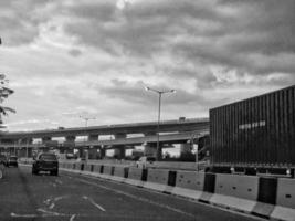 Jakarta, Indonesia in July 2022. Dusk on the road in Jakarta, where the traffic is quite congested because it coincides with work hours. photo