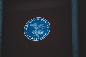 Jakarta, Indonesia in July 2022. A round-shaped American Bureau of Shipping sticker stuck on an export-import container photo