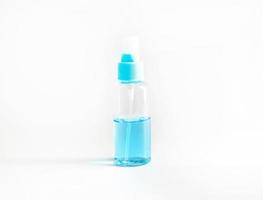 Plastic bottle of alcohol gel or spray for wash hand for protect virus, disease, bacteria, grime and dirt  isolated on white background. Container object and liquid. Health or medical concept. photo