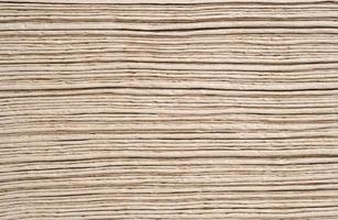 Light brown tissue paper laid out in layers. Wipe clean, pattern, texture, background. photo