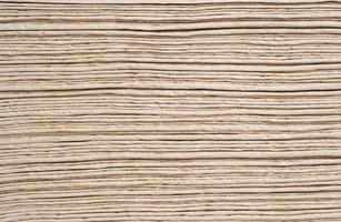 Light brown tissue paper laid out in layers. Wipe clean, pattern, texture, background. photo