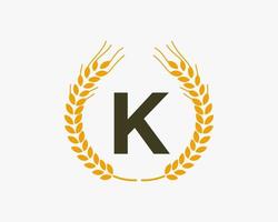 letra k diseño de logotipo de agricultura con símbolo de trigo vector