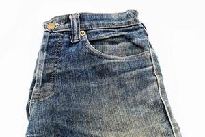 Blue jeans isolated on white background, jeans stacked photo