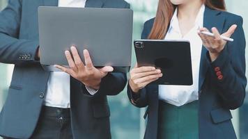 Businessman using tablet analyzing sales data and economic growth graph chart. Business strategy. Abstract icon. Digital marketing. video