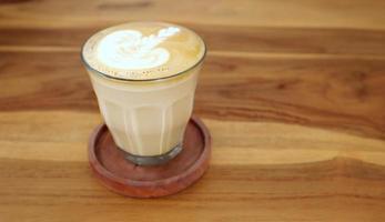 Coffee cafe latte with carved foam foam photo