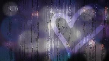 Heart shape on wet grass with water drops and colorful city light bokeh. Hand drawn heart on glass window surface, rainy day. Romance love bubble droplets backdrop. Sadness romantic rain. Concept love photo