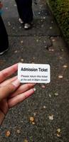 Tokyo, Japan in July 2019. A woman's hand holds an Admission Ticket to enter Shinjuku Gyoen National Garden photo