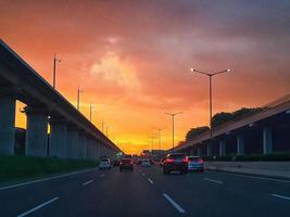 Jakarta, Indonesia in July 2022. Dusk on the road in Jakarta, where the traffic is quite congested because it coincides with work hours. photo