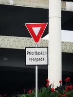 Cyclists Priority signs posted on one of the streets in the city of Jakarta. photo