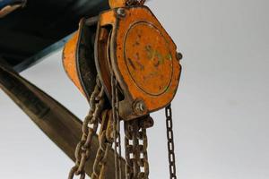 Rusty industrial chain hoist photo